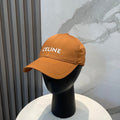 CELINE BASEBALL CAP MODEL 650750 IN BURNT ORANGE COTTON