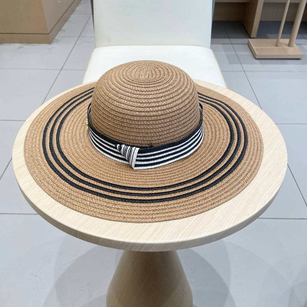CELINE WIDE BRIM HAT MODEL 650410 IN BROWN WITH BLACK STRIPES WOVEN STRAW