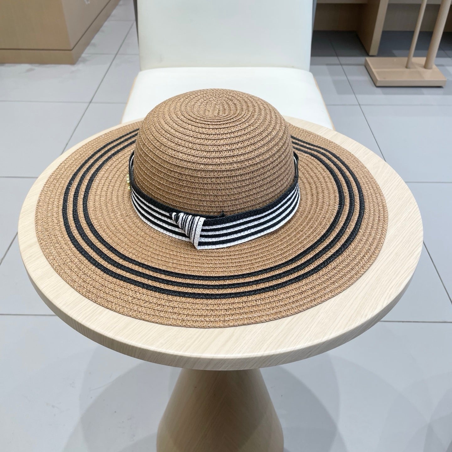 CELINE WIDE BRIM HAT MODEL 650410 IN BROWN WITH BLACK STRIPES WOVEN STRAW